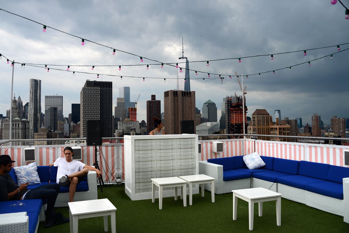 07-07 Outdoor Bar And DJ With View To World Trade Center And Financial District From The Rooftop At NoMo SoHo New York City